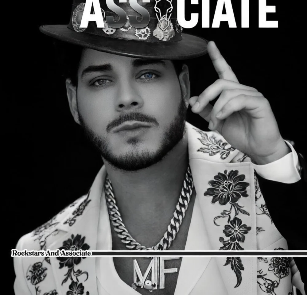 Michael Formica in a white jacket and decorated hat